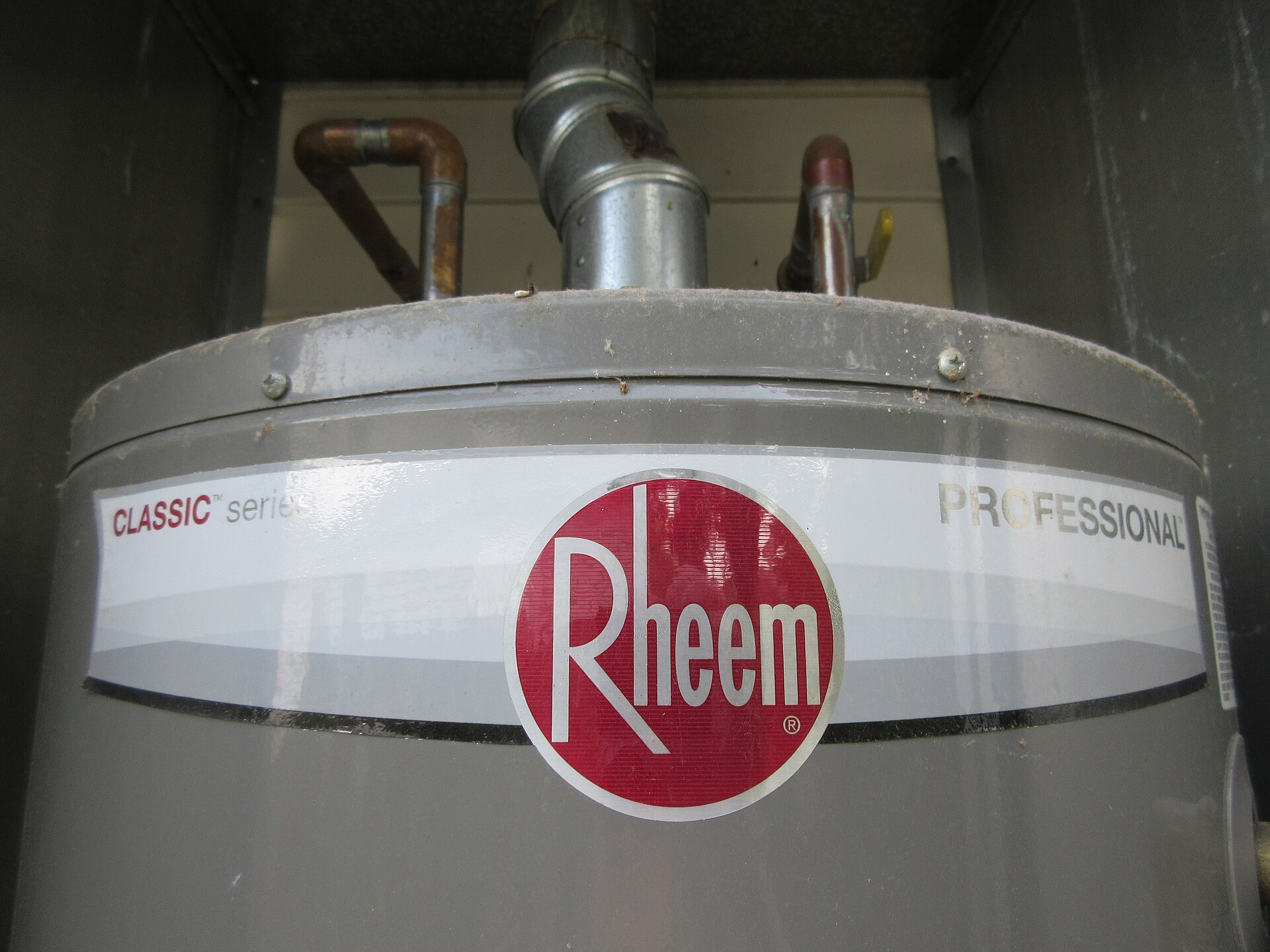 File:Rheem home gas water heater tank - top of tank.jpg